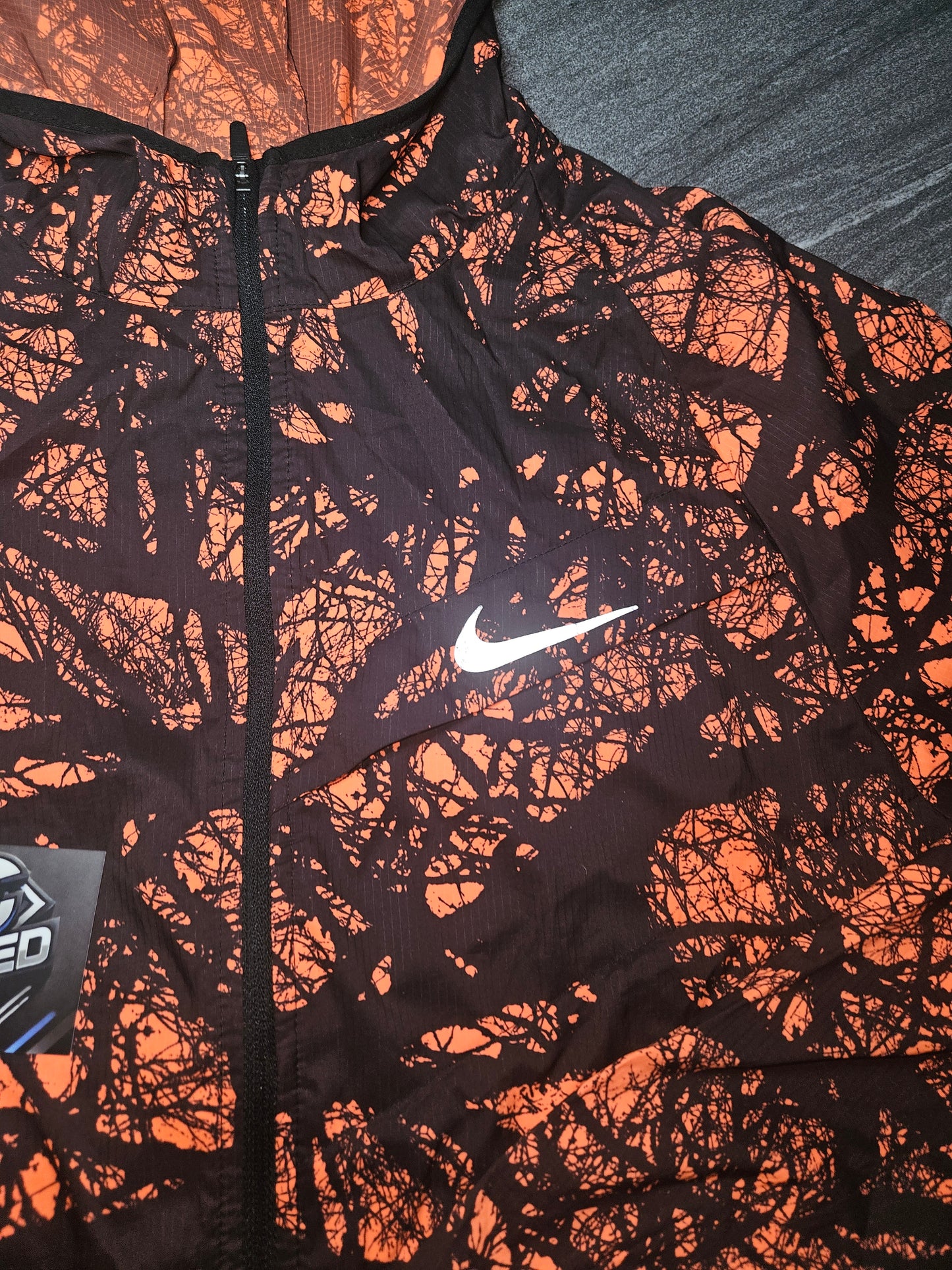 Nike Enchanted forest orange jacket